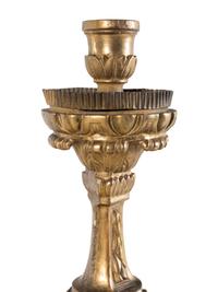 A Set of Four Continental Baroque Style Carved Giltwood Torchères