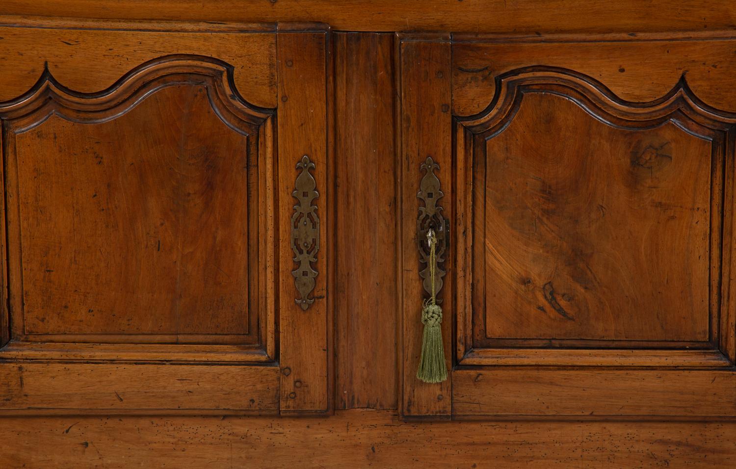 A Louis XV Provincial Walnut Serving Cabinet