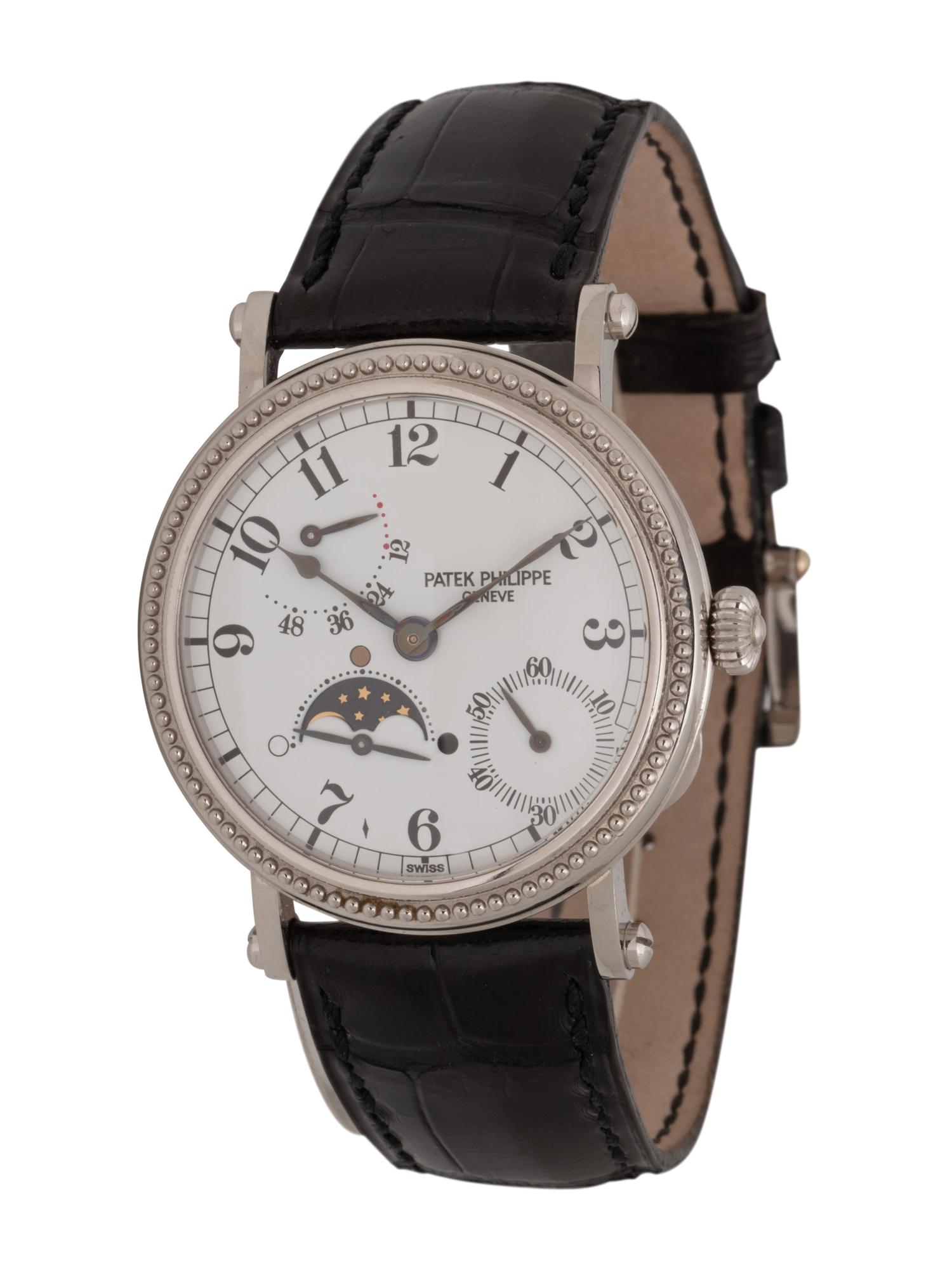 PATEK PHILIPPE, REF. 5015 PLATINUM MOONPHASE WATCH