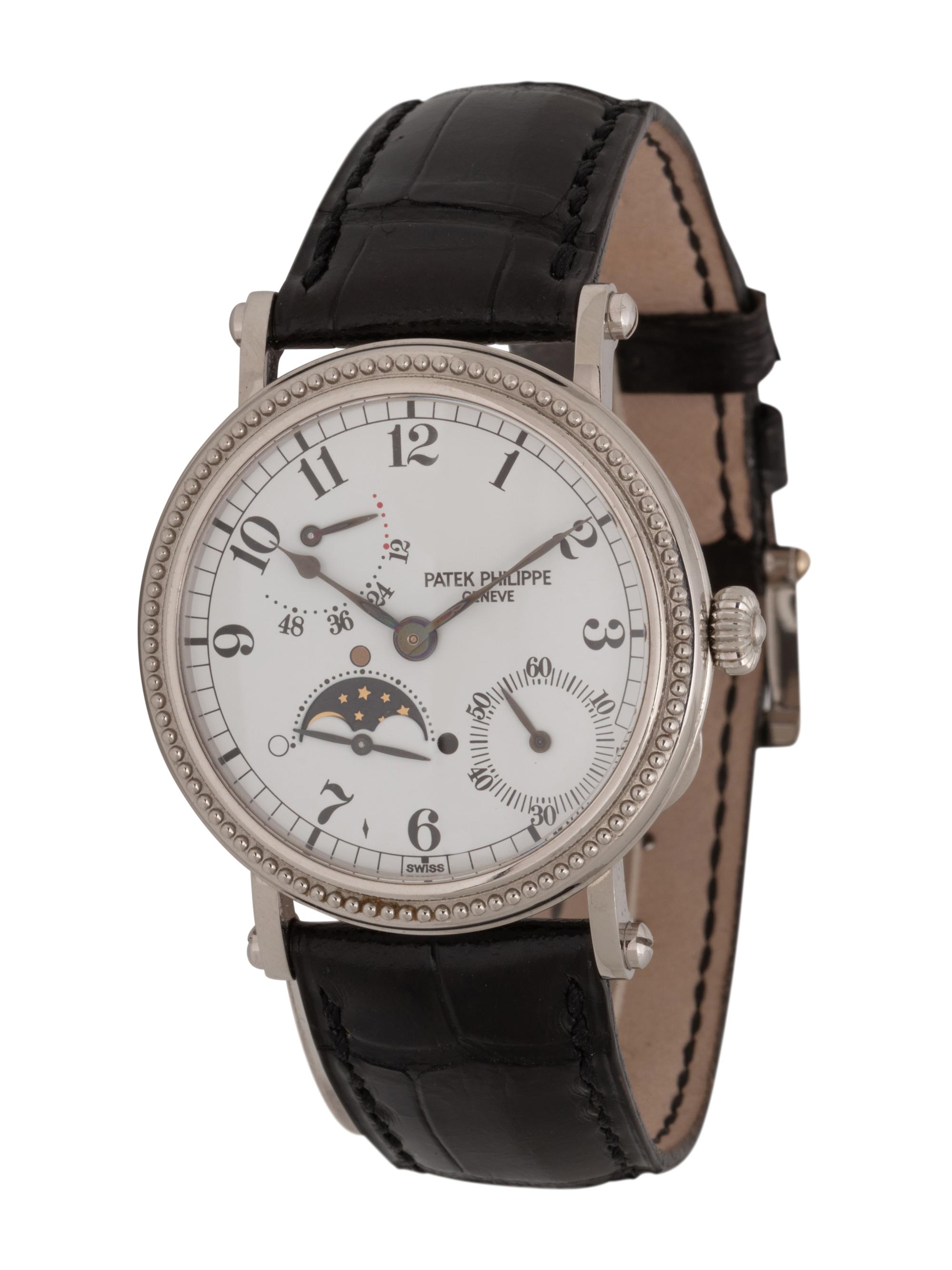 PATEK PHILIPPE, REF. 5015 PLATINUM MOONPHASE WATCH