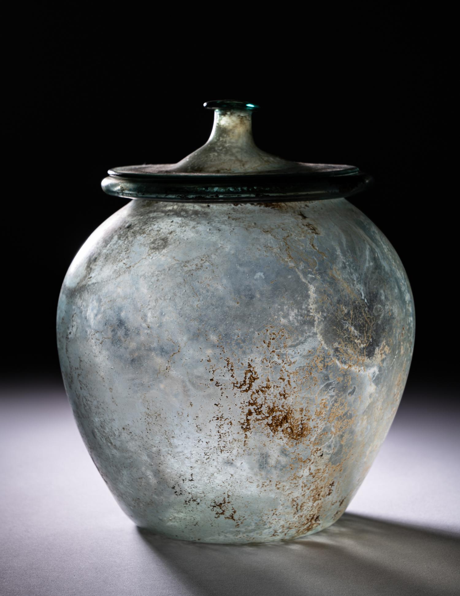 A Roman Blue-Green Glass Cinerary Urn