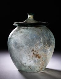 A Roman Blue-Green Glass Cinerary Urn