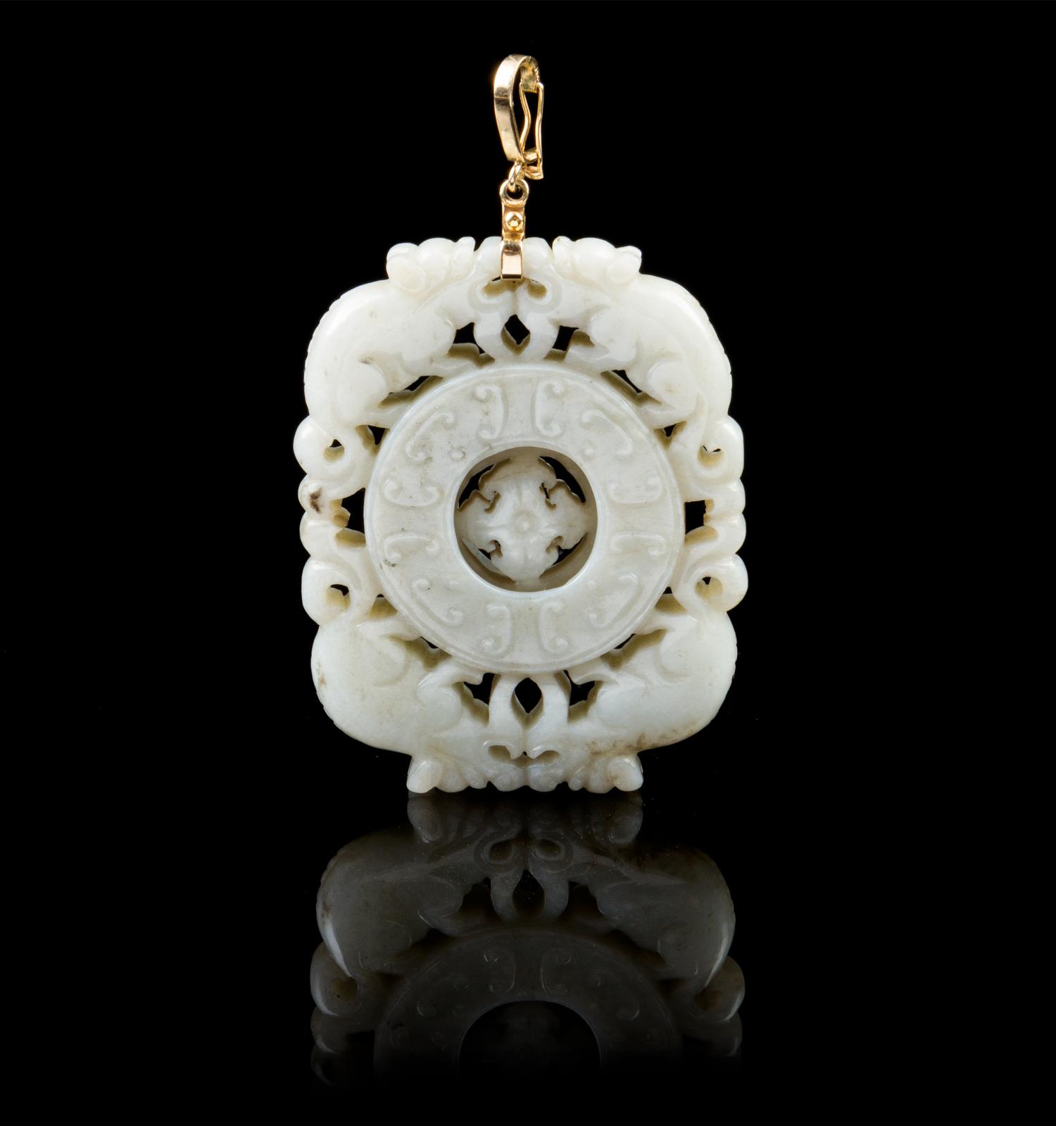A Chinese Jadeite Pendant 18TH/19TH CENTURY Length 2 1/2 inches. — 18TH/19TH CENTURY