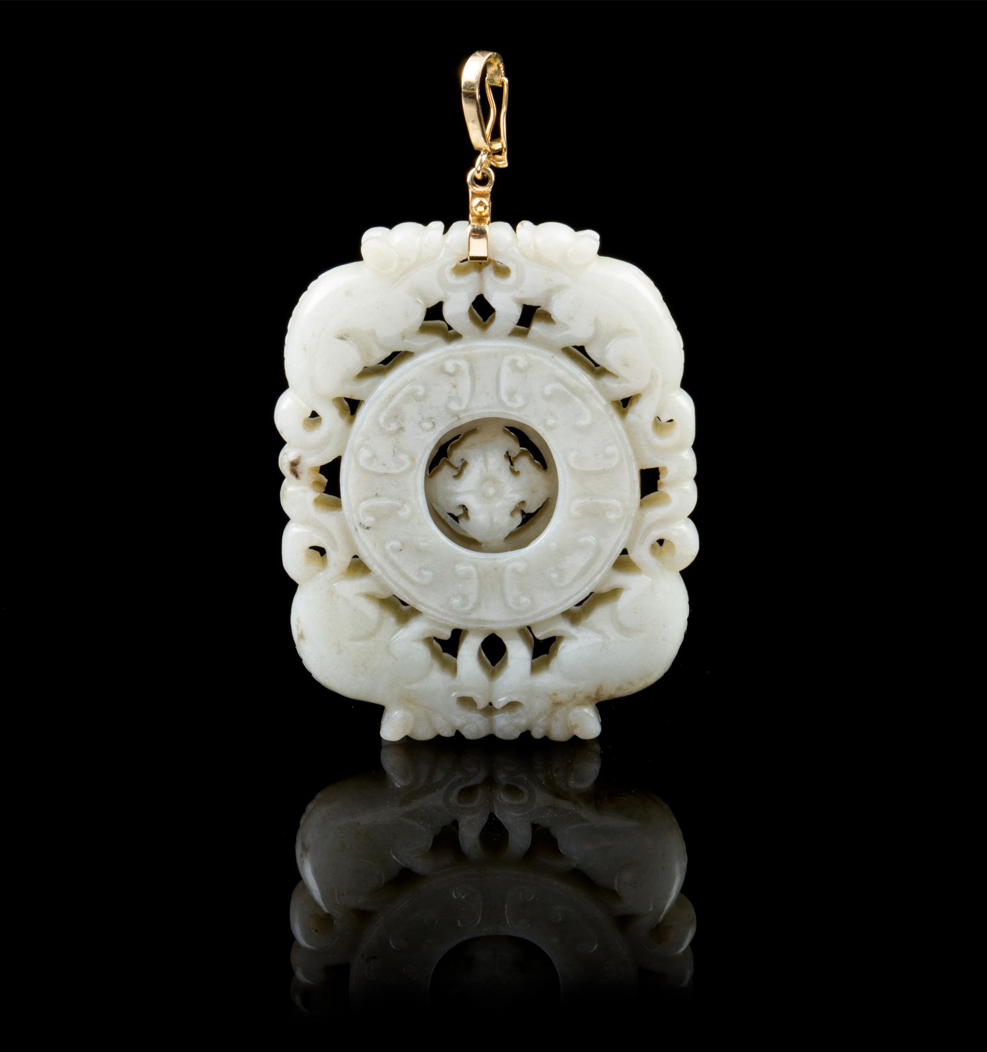 A Chinese Jadeite Pendant 18TH/19TH CENTURY Length 2 1/2 inches. — 18TH/19TH CENTURY