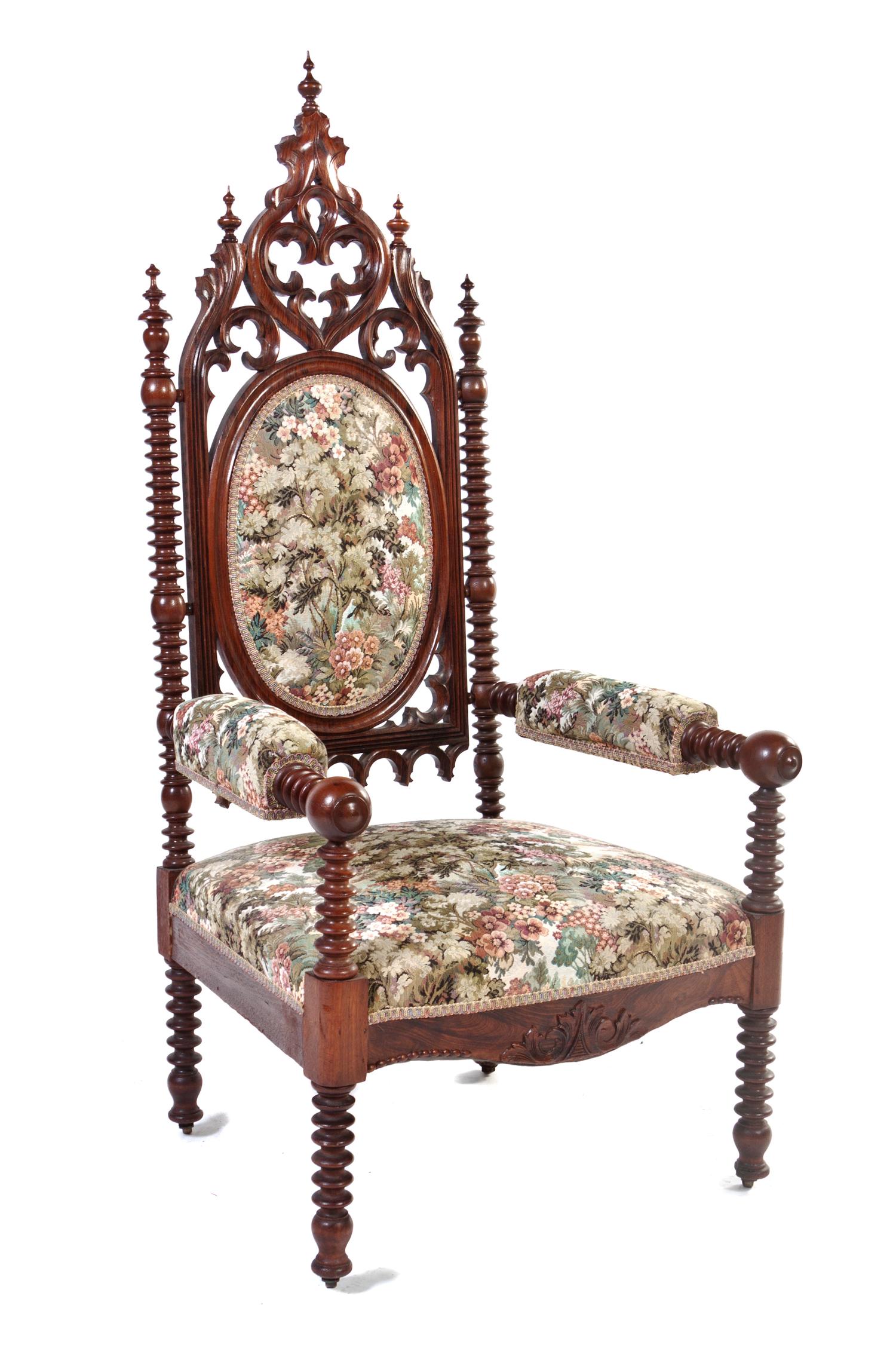 A Gothic Revival Rosewood Open Armchair, Height 56 inches.