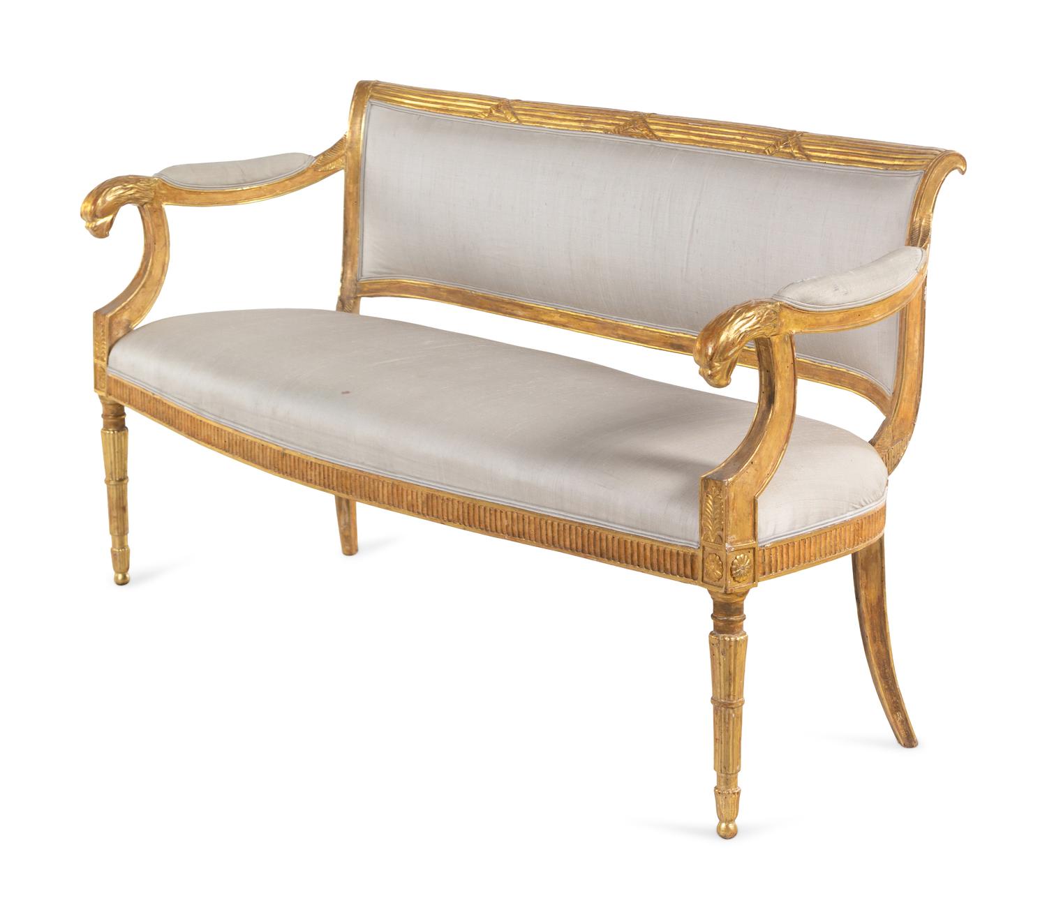 A Pair of Northern Italian Giltwood Sofas with Griffin Supports