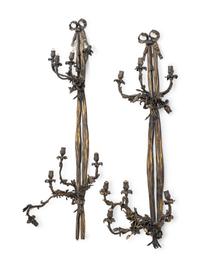 A Pair of Large Louis XVI Style Bronze Seven-Light Sconces