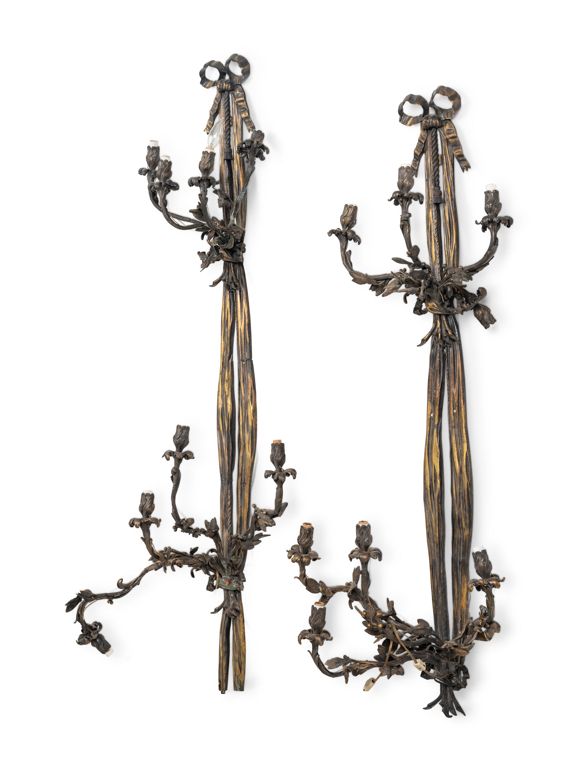 A Pair of Large Louis XVI Style Bronze Seven-Light Sconces
