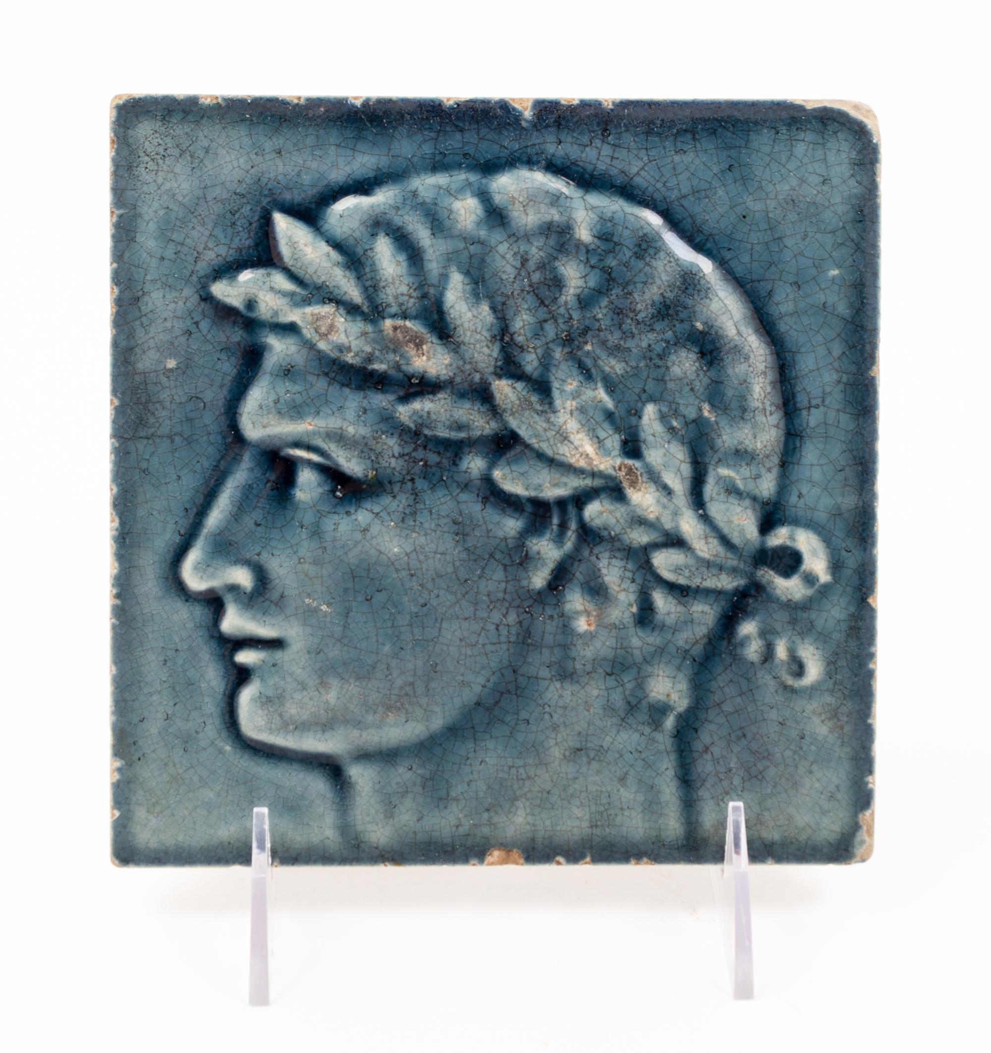 An Arts and Crafts Pottery Tile Height 6 x width 6 inches. — 20TH CENTURY