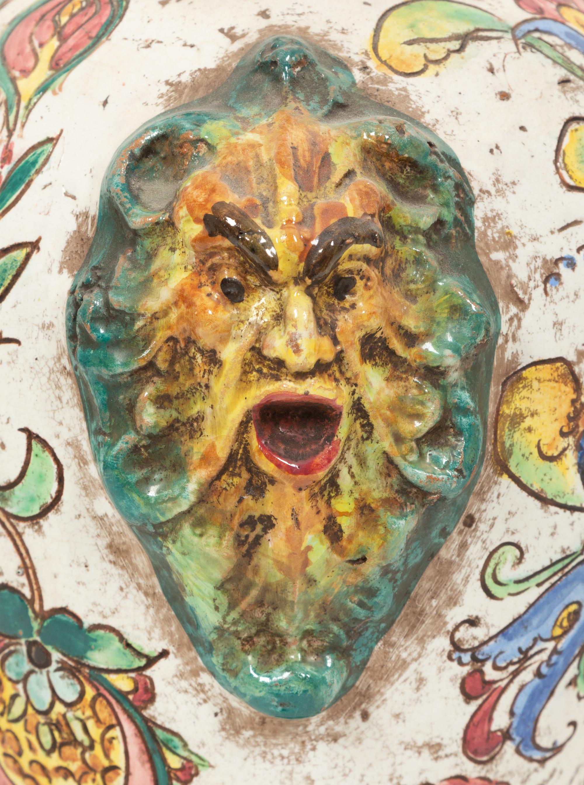 An Italian Majolica Covered Urn with Lion Mask Handles
