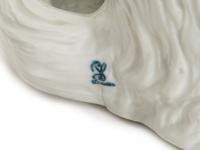 A Dresden Porcelain Bolognese Dog Figure