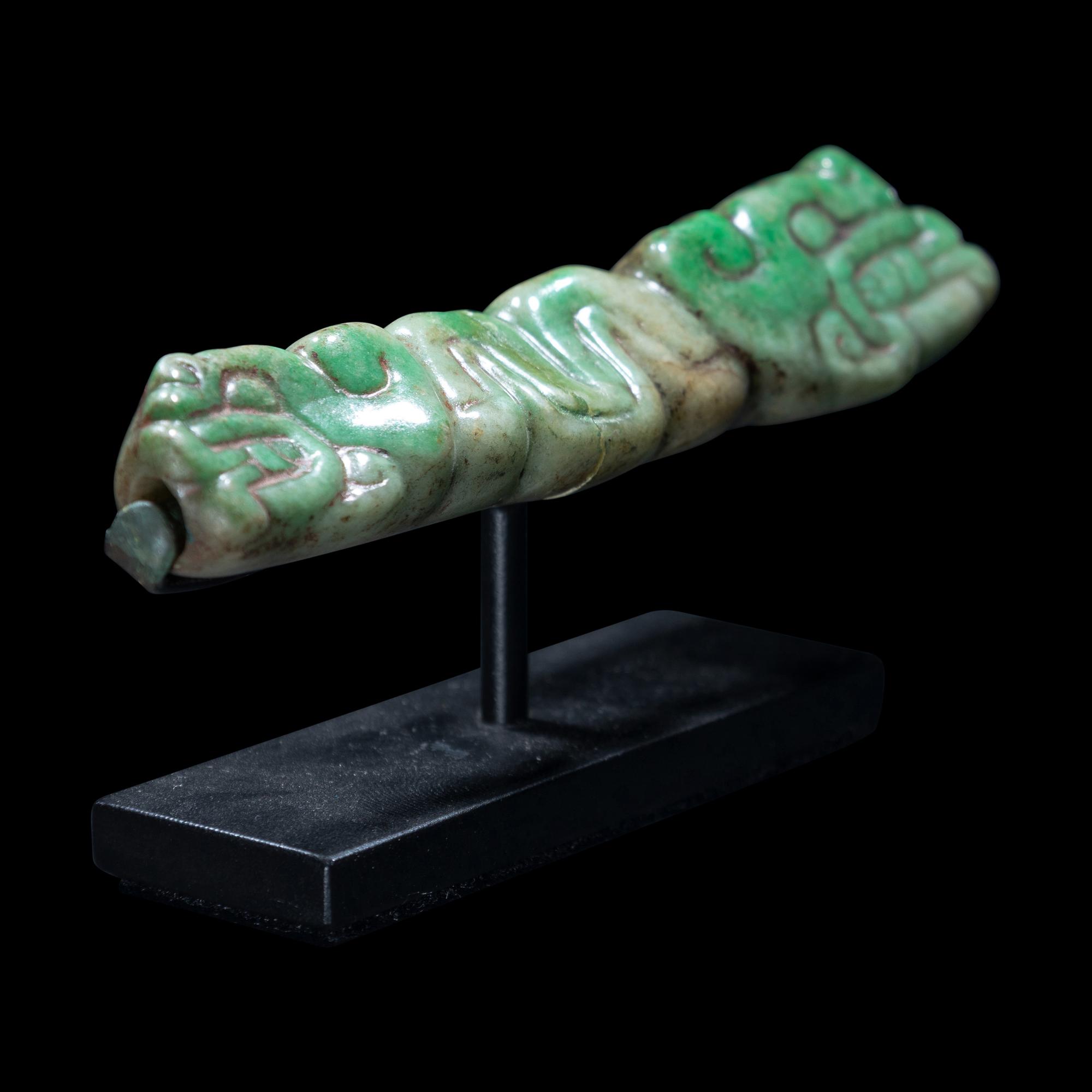A Maya Jade Serpent Pendant