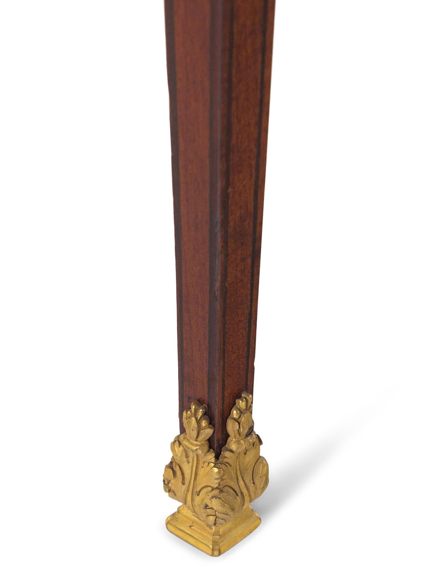 A Louis XVI Style Gilt Bronze Mounted Mahogany Table à Écrire