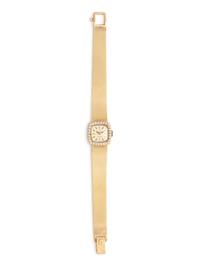 OMEGA, RETAILED BY TIFFANY & CO., 14K YELLOW GOLD AND DIAMOND WATCH