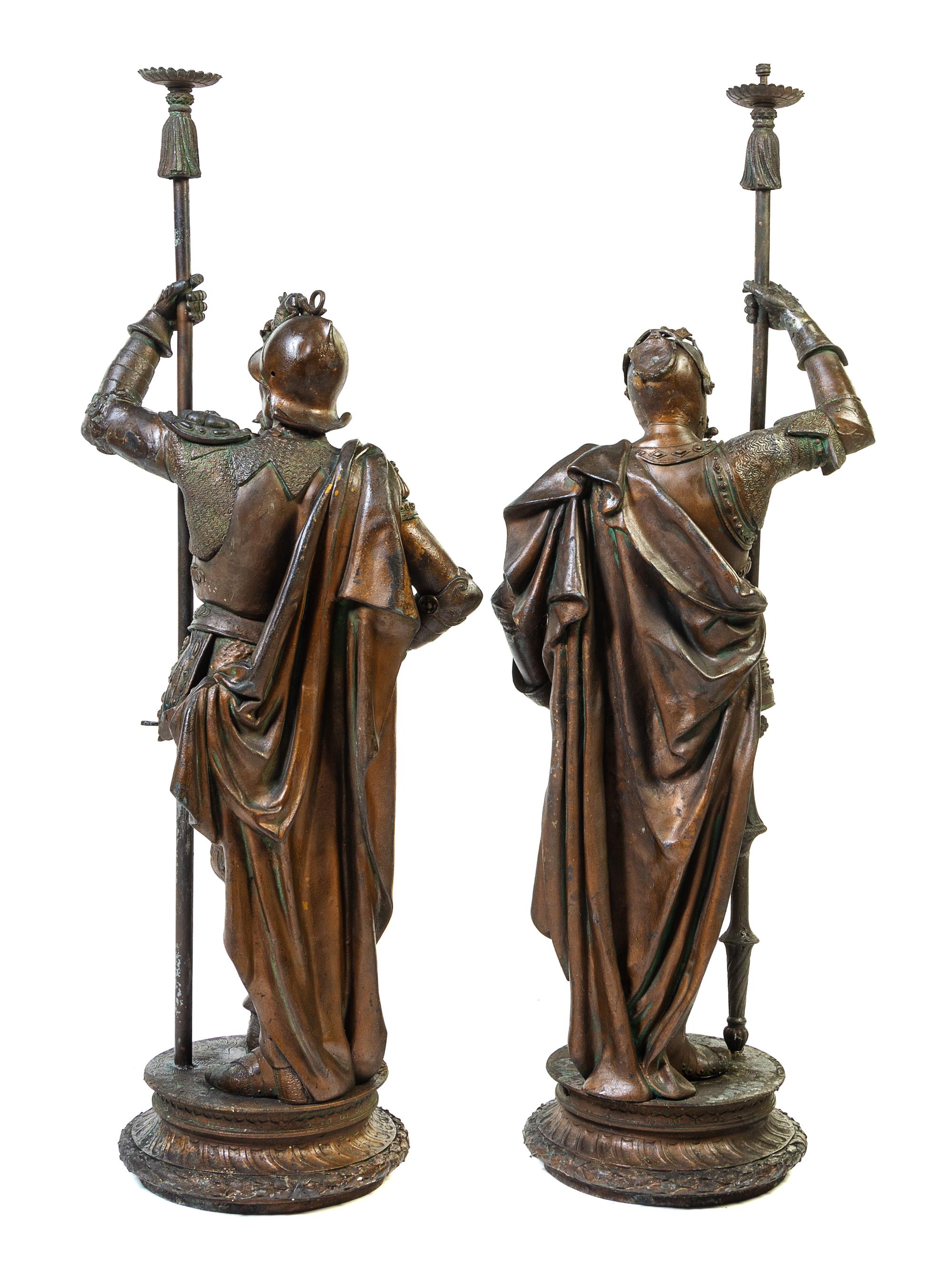 A Pair of Large Cast Metal Figural Torcheres Height 54 inches. — LATE 19TH CENTURY