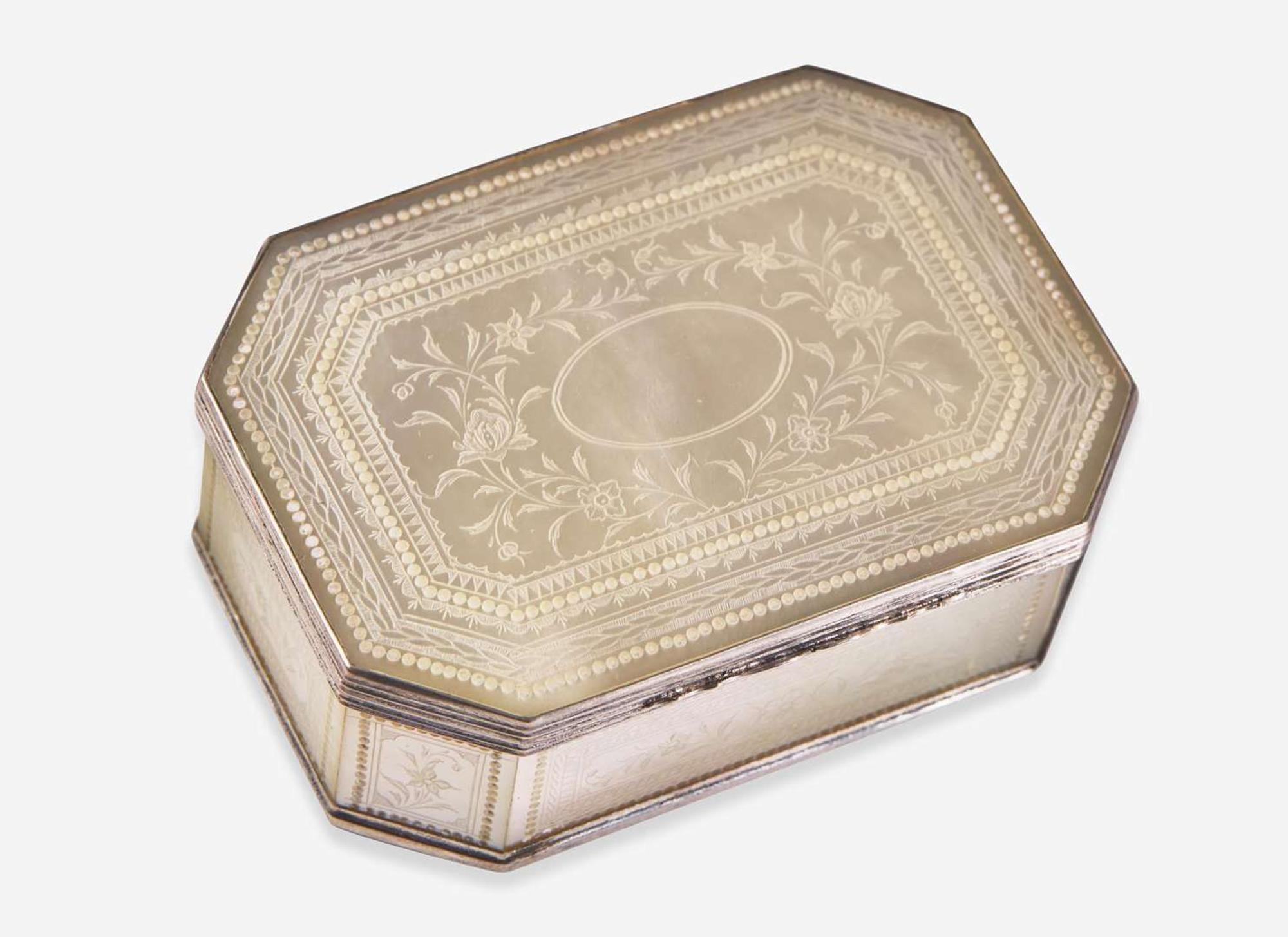 A Georgian silver-mounted mother-of-pearl snuff box and gold-mounted carved shell cameo brooch, early 19th century