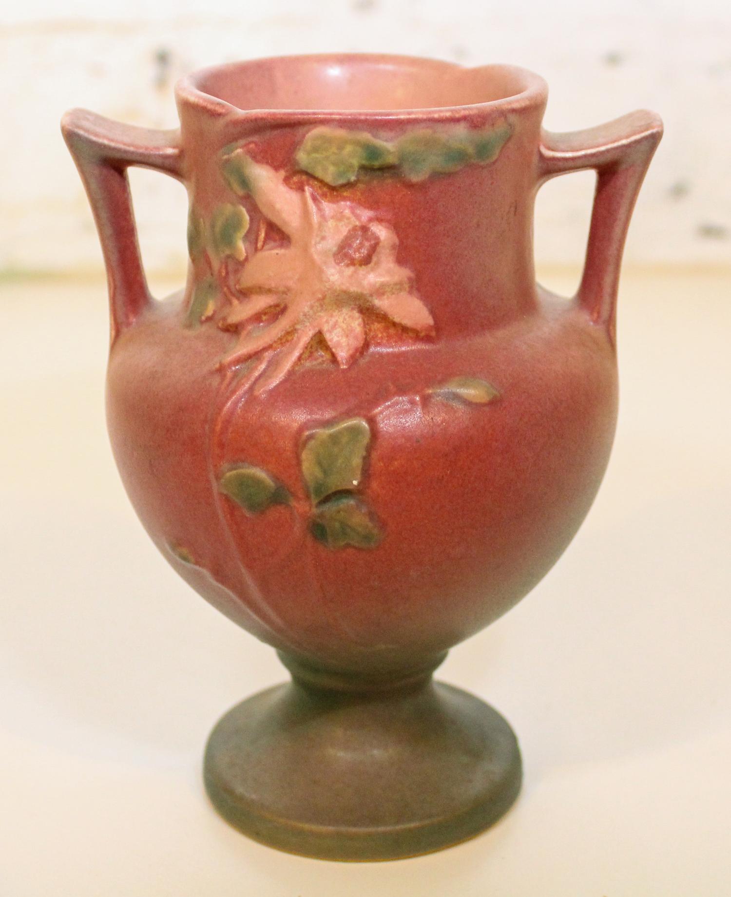 A Roseville Pottery Vase Height 6 1/4 inches.