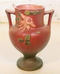 A Roseville Pottery Vase Height 6 1/4 inches.