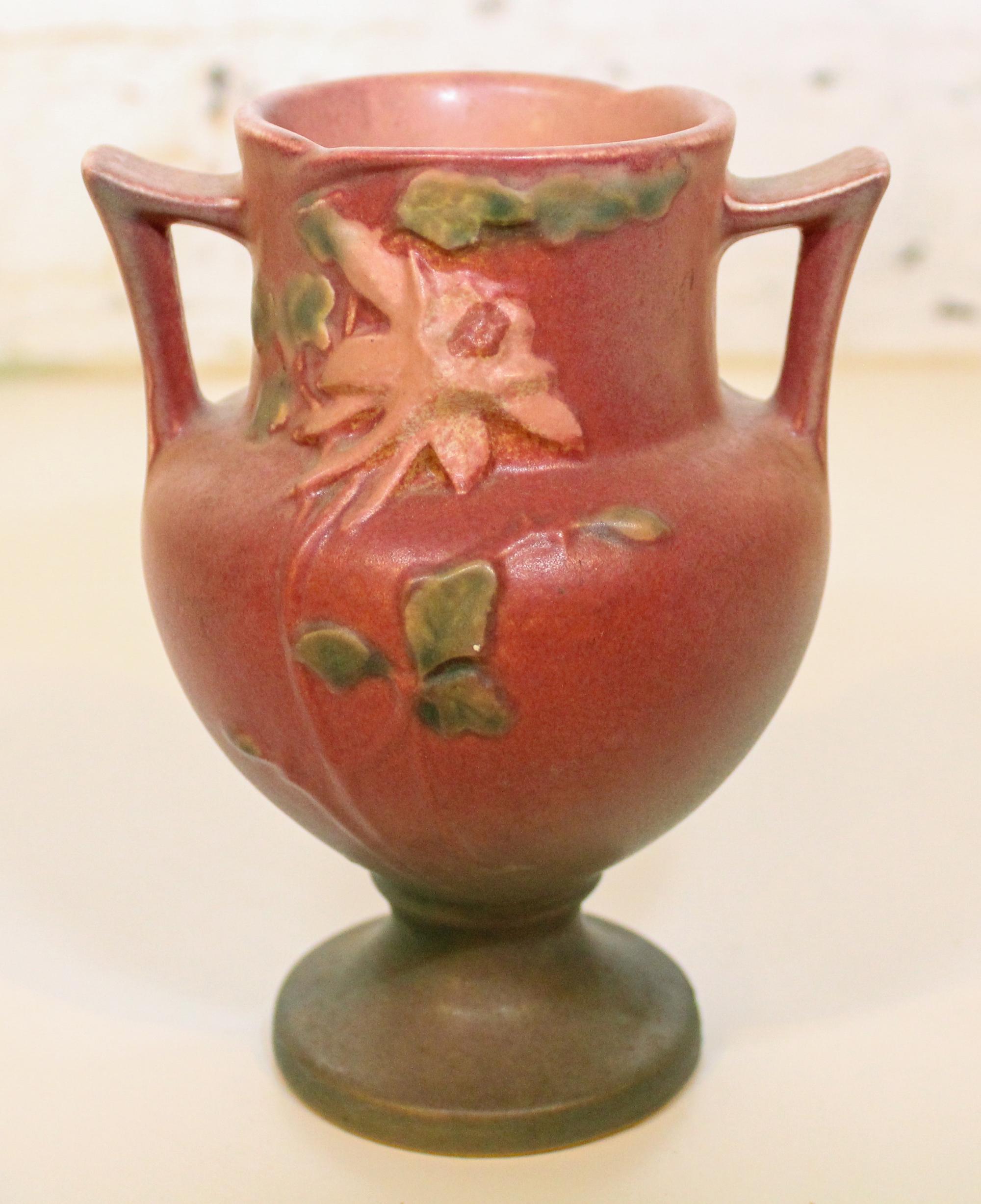 A Roseville Pottery Vase Height 6 1/4 inches.