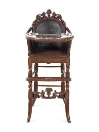 A Rococo Revival Carved Wood High Chair with a Fitted American Silver-Plate Tray