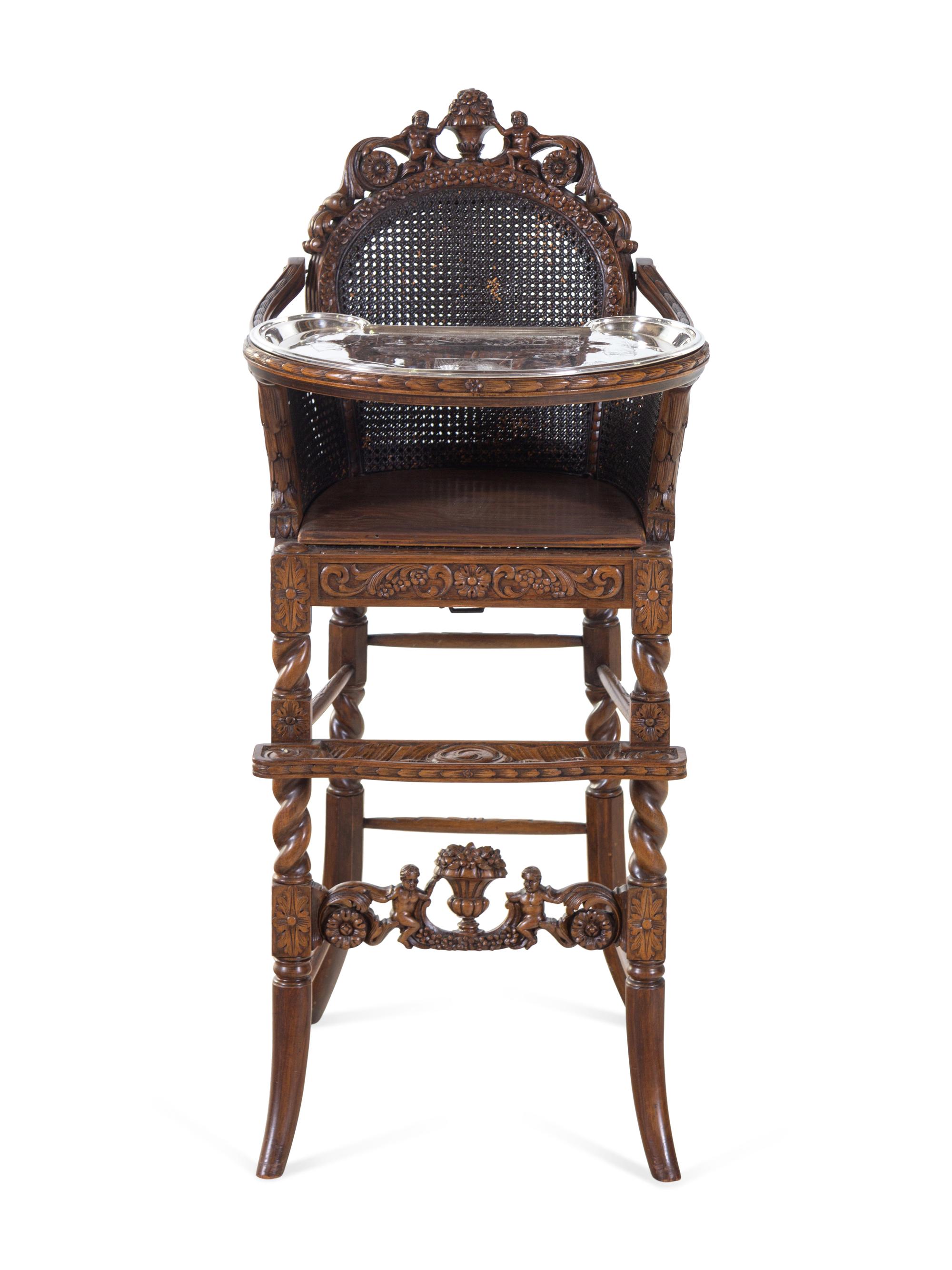 A Rococo Revival Carved Wood High Chair with a Fitted American Silver-Plate Tray
