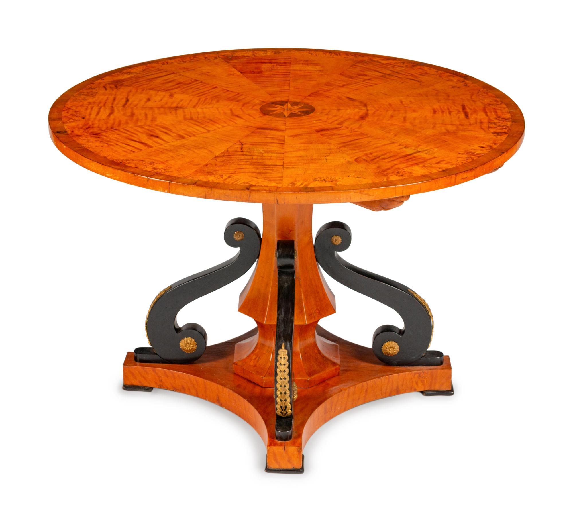 An Austrian Part Ebonized and Inlaid Ash and Walnut Center Table — 19TH CENTURY