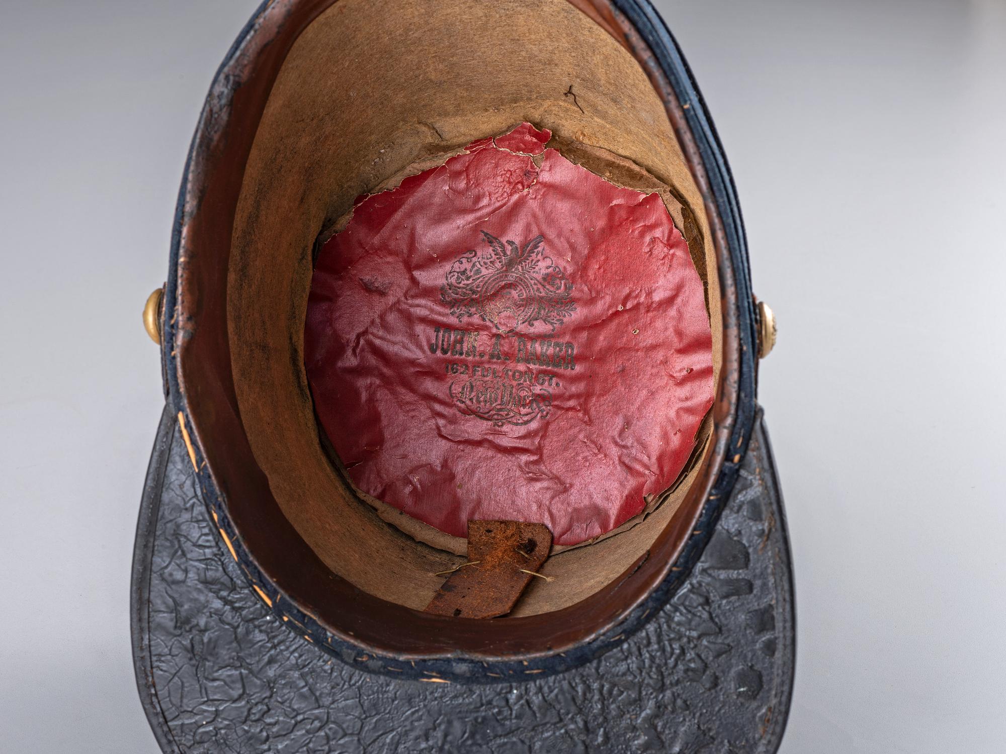 [MILITIA]. 1851 pattern New York State infantry shako. Manufactured by John A. Baker, New York.