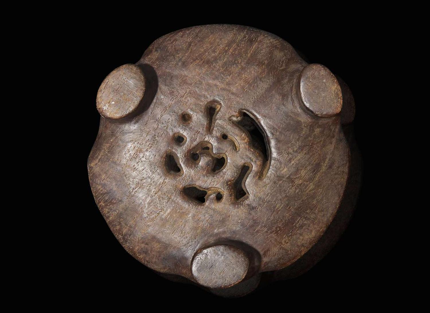 A carved Chinese hardwood censer stand, possibly Tieli Mu 硬木底座 可能為鐵梨木