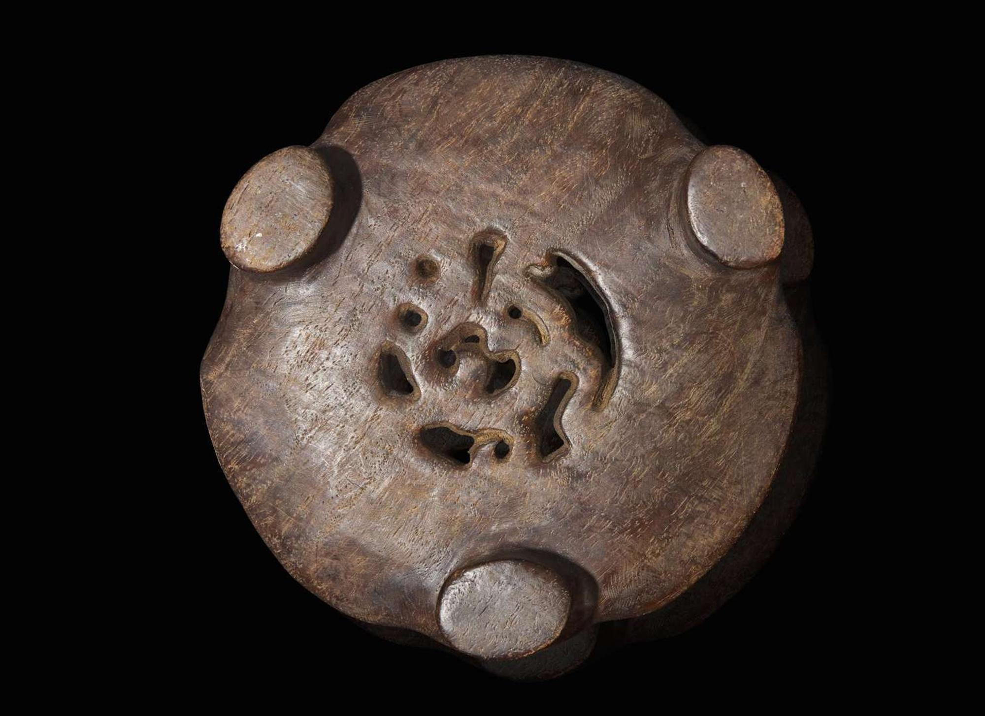 A carved Chinese hardwood censer stand, possibly Tieli Mu 硬木底座 可能為鐵梨木