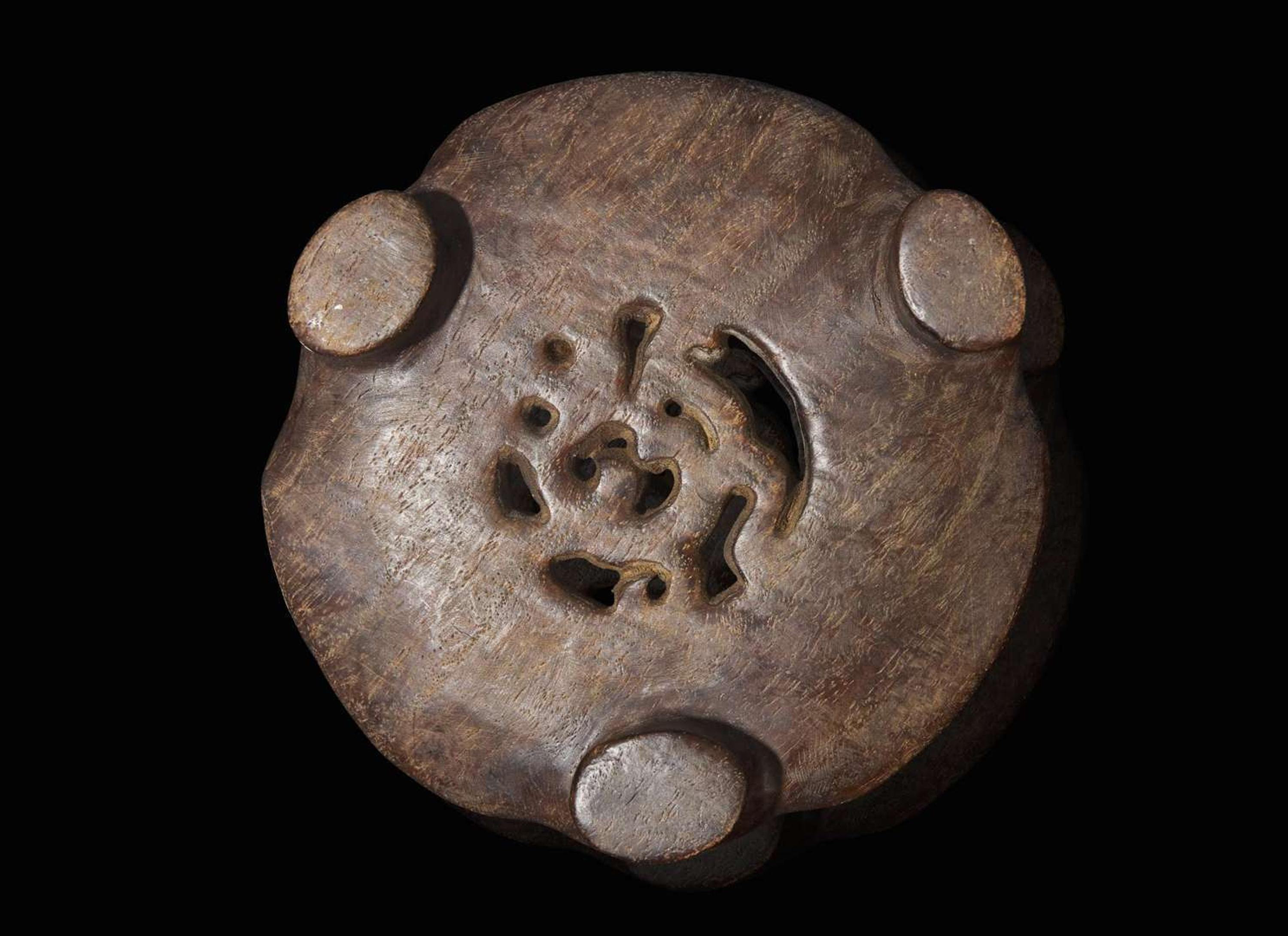 A carved Chinese hardwood censer stand, possibly Tieli Mu 硬木底座 可能為鐵梨木
