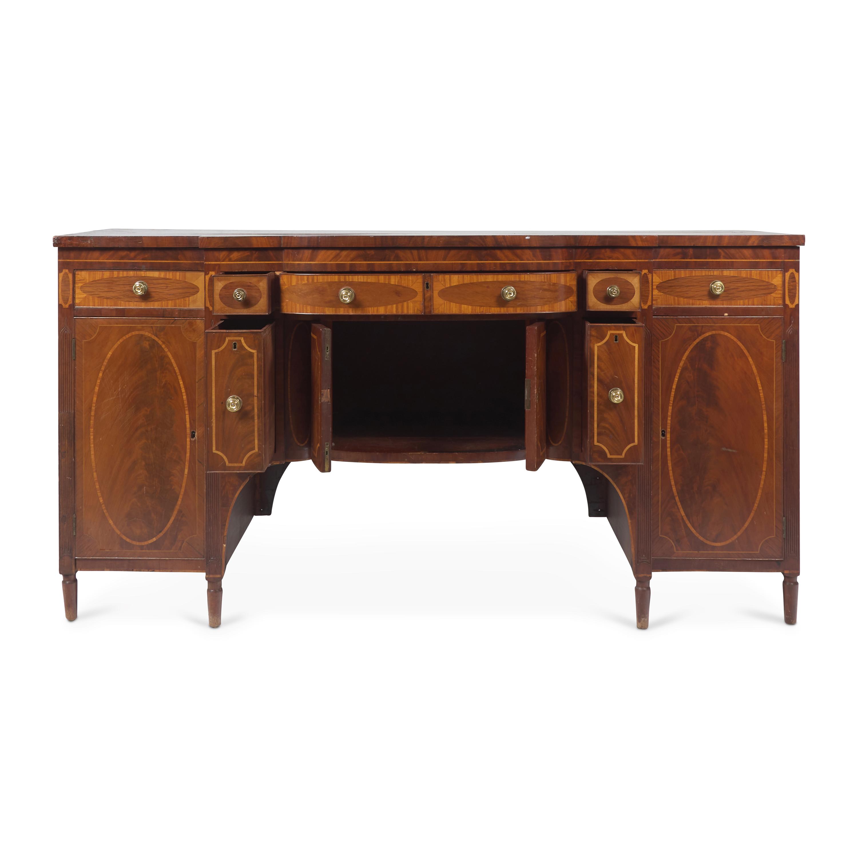 A Federal Inlaid, Figured and Carved Mahogany Sideboard