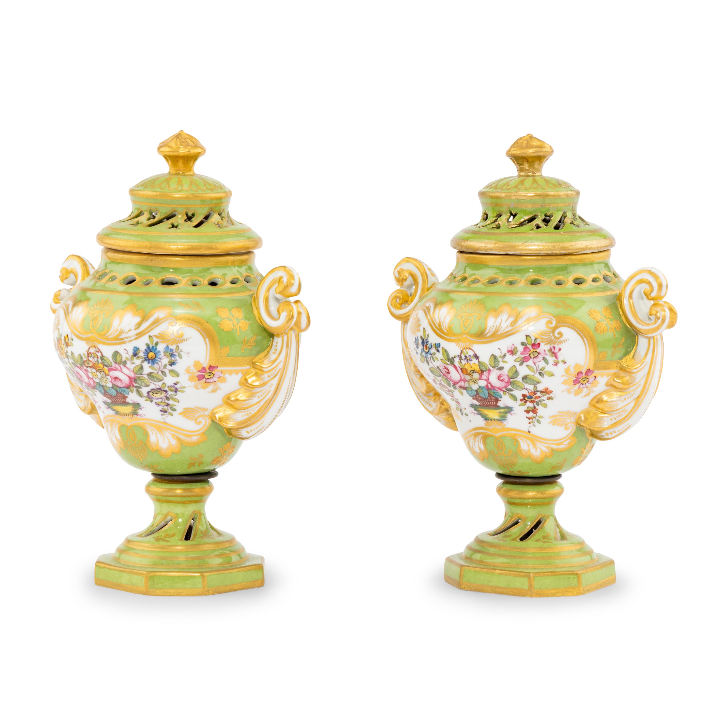 A Pair of Rockingham Porcelain Potpourri Urns