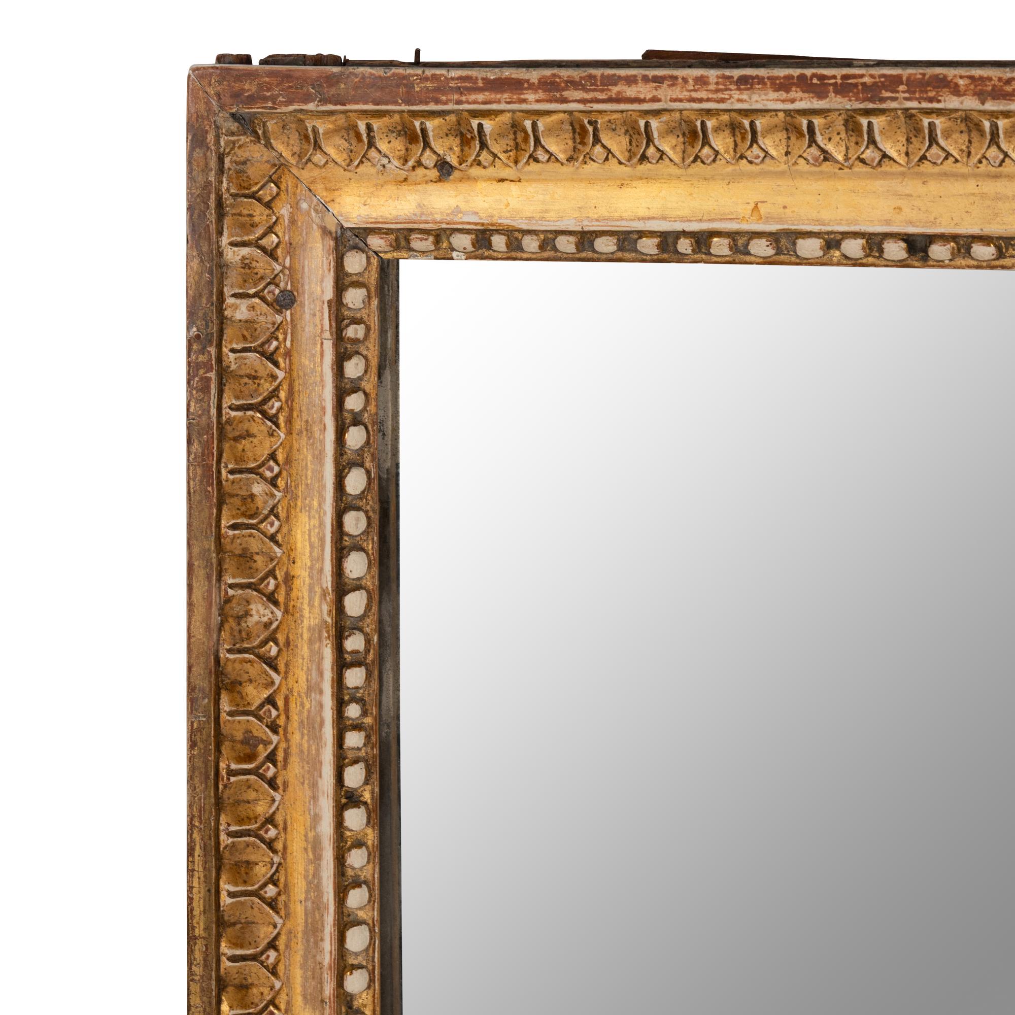 A Louis XVI Giltwood Mirror