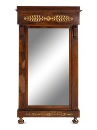 An Empire Walnut and Parcel Gilt Mirror