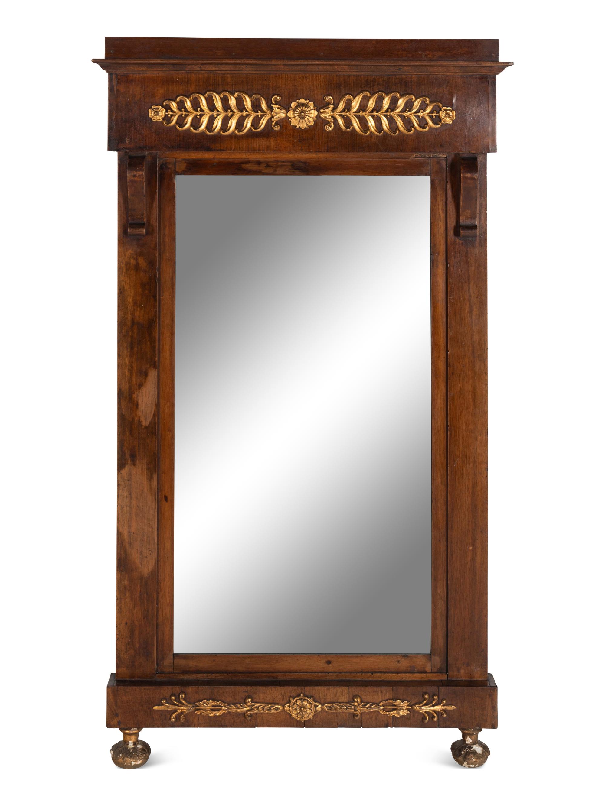An Empire Walnut and Parcel Gilt Mirror