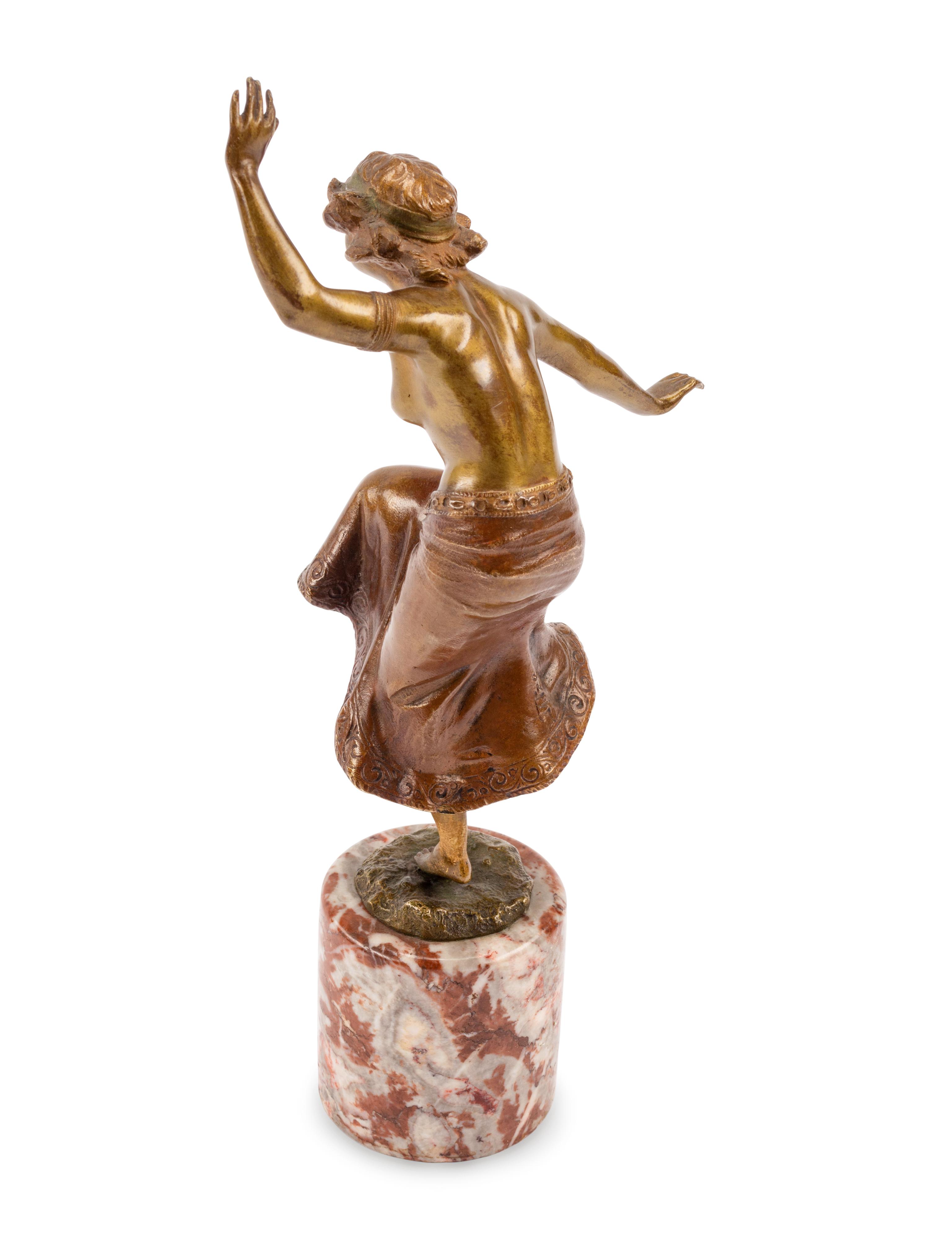 An Austrian Gilt Bronze Figure of a Dancer on a Marble Base