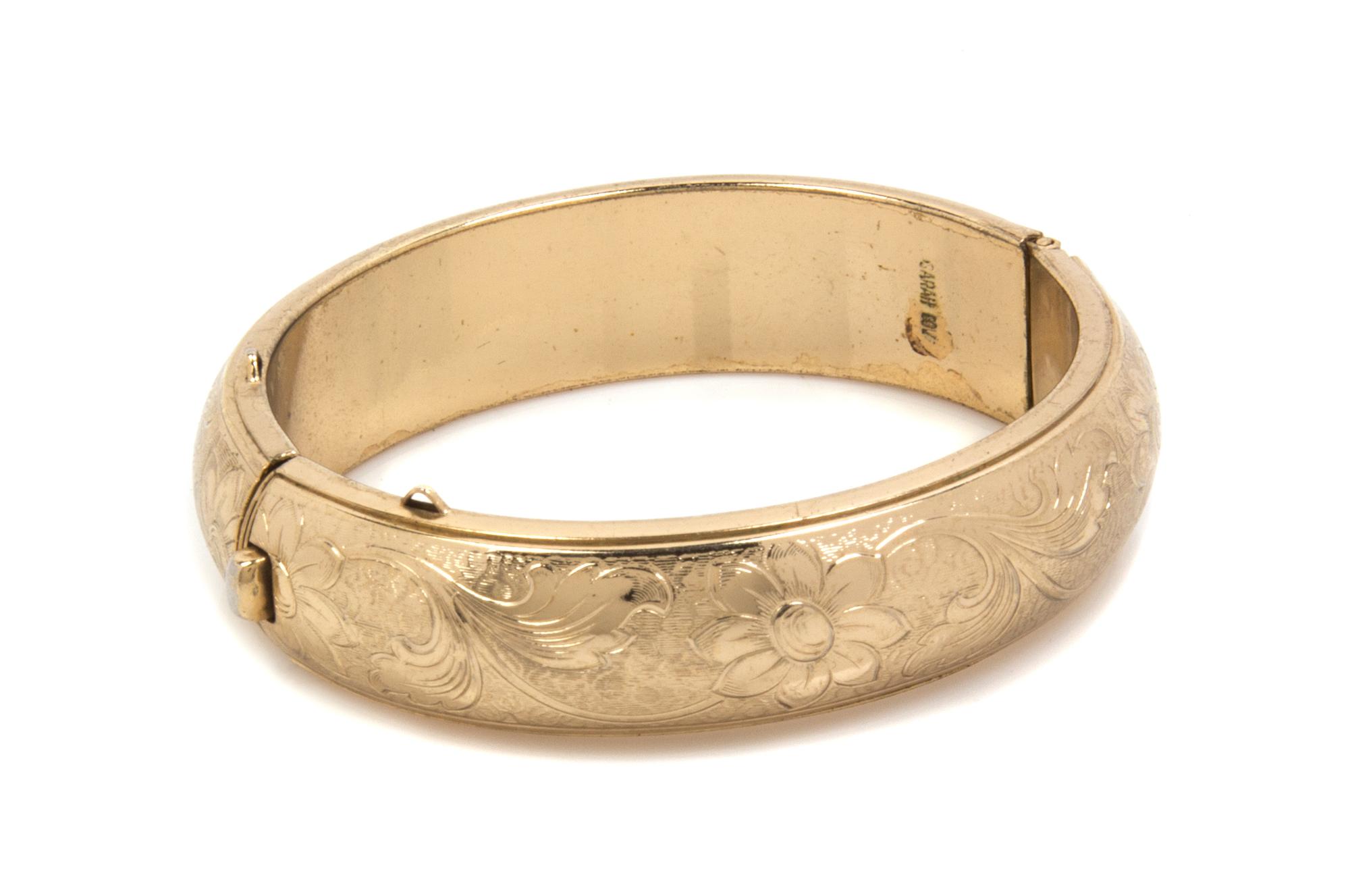 A Sarah Coventry Goldtone Bangle,