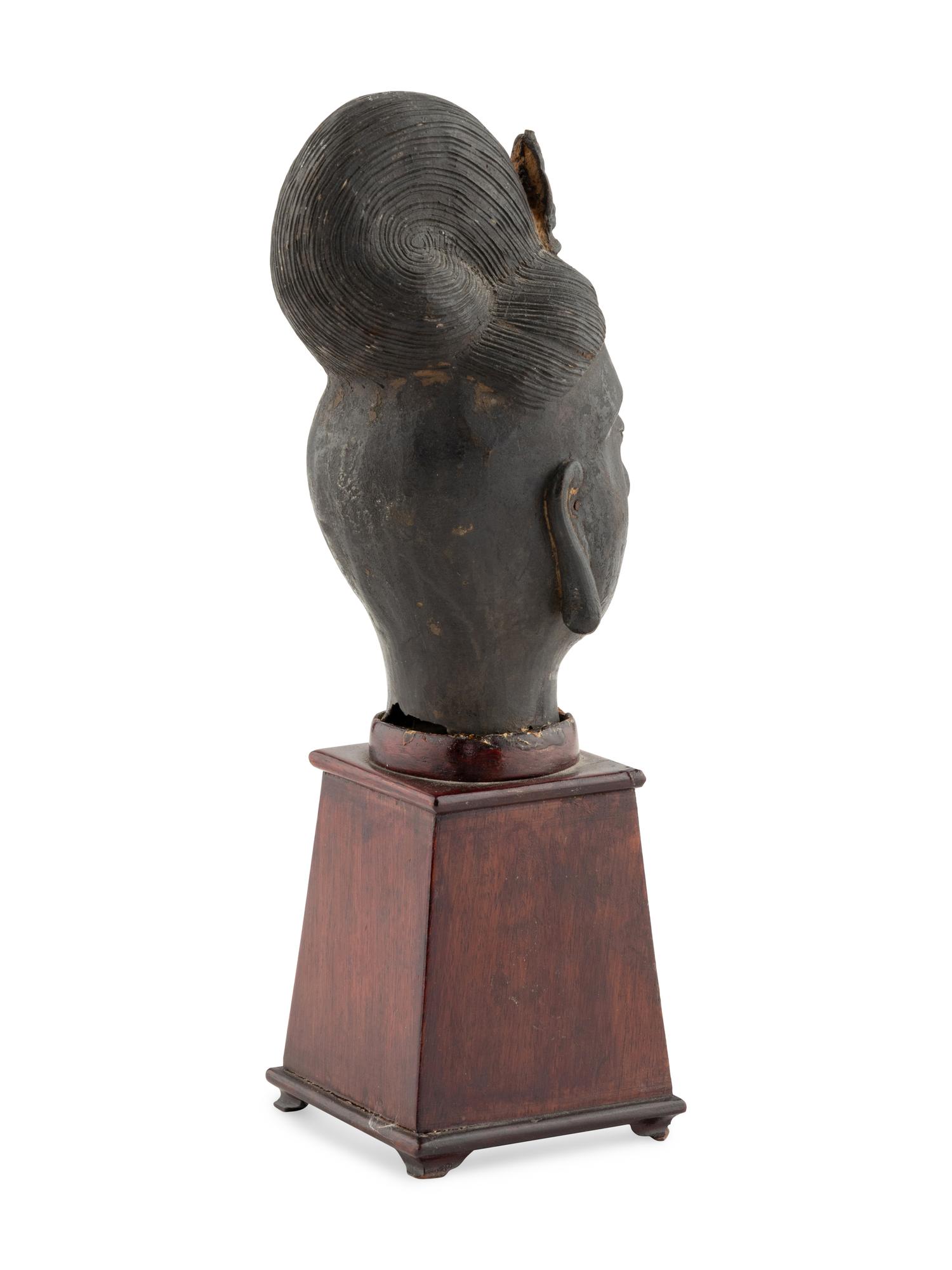 A Chinese Bronze Head of Guanyin