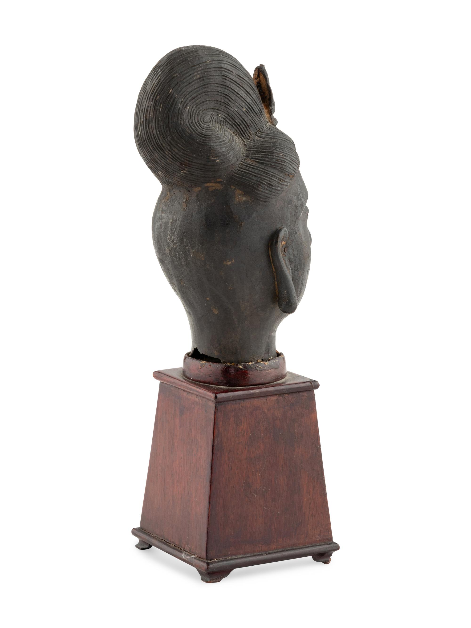 A Chinese Bronze Head of Guanyin