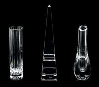 A Baccarat Obelisk and Two Baccarat Bud Vases Height of obelisk 10 inches.
