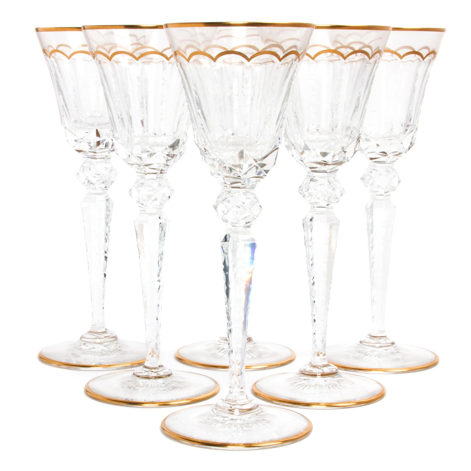 A Set of Eighteen Saint Louis Crystal Parcel Gilt Cut Glass Wine Goblets Height 10 inches.