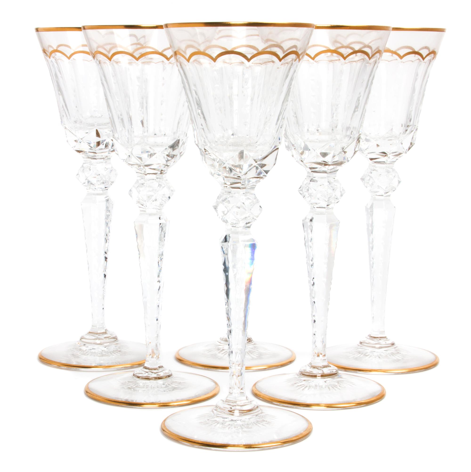 A Set of Eighteen Saint Louis Crystal Parcel Gilt Cut Glass Wine Goblets Height 10 inches.
