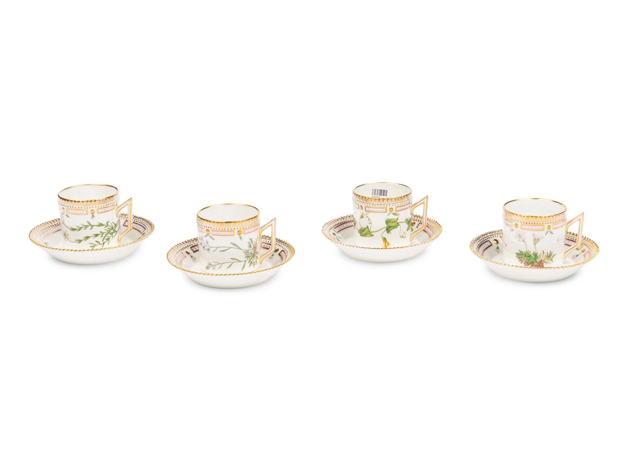 A Set of Four Royal Copenhagen Flora Danica Porcelain Coffee Cups and Saucers