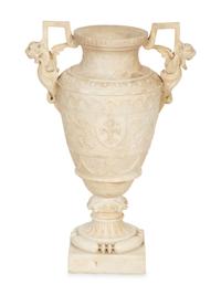 An Italian Carved Marble Urn with Griffin Handles