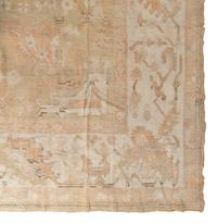 An Oushak Wool Rug
