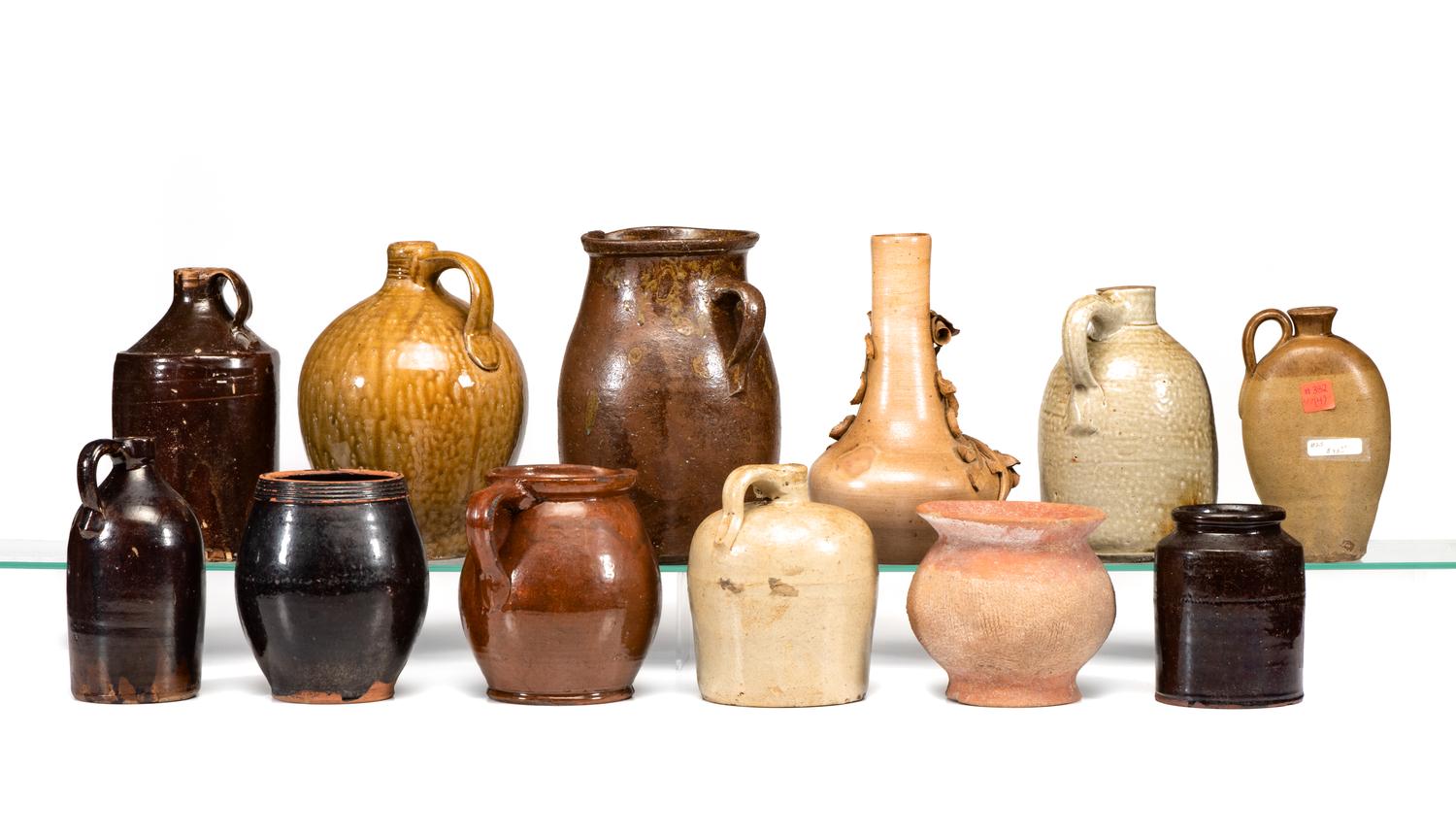 Twelve Stoneware, Redware and Earthenware Jugs, Pitchers and Vases