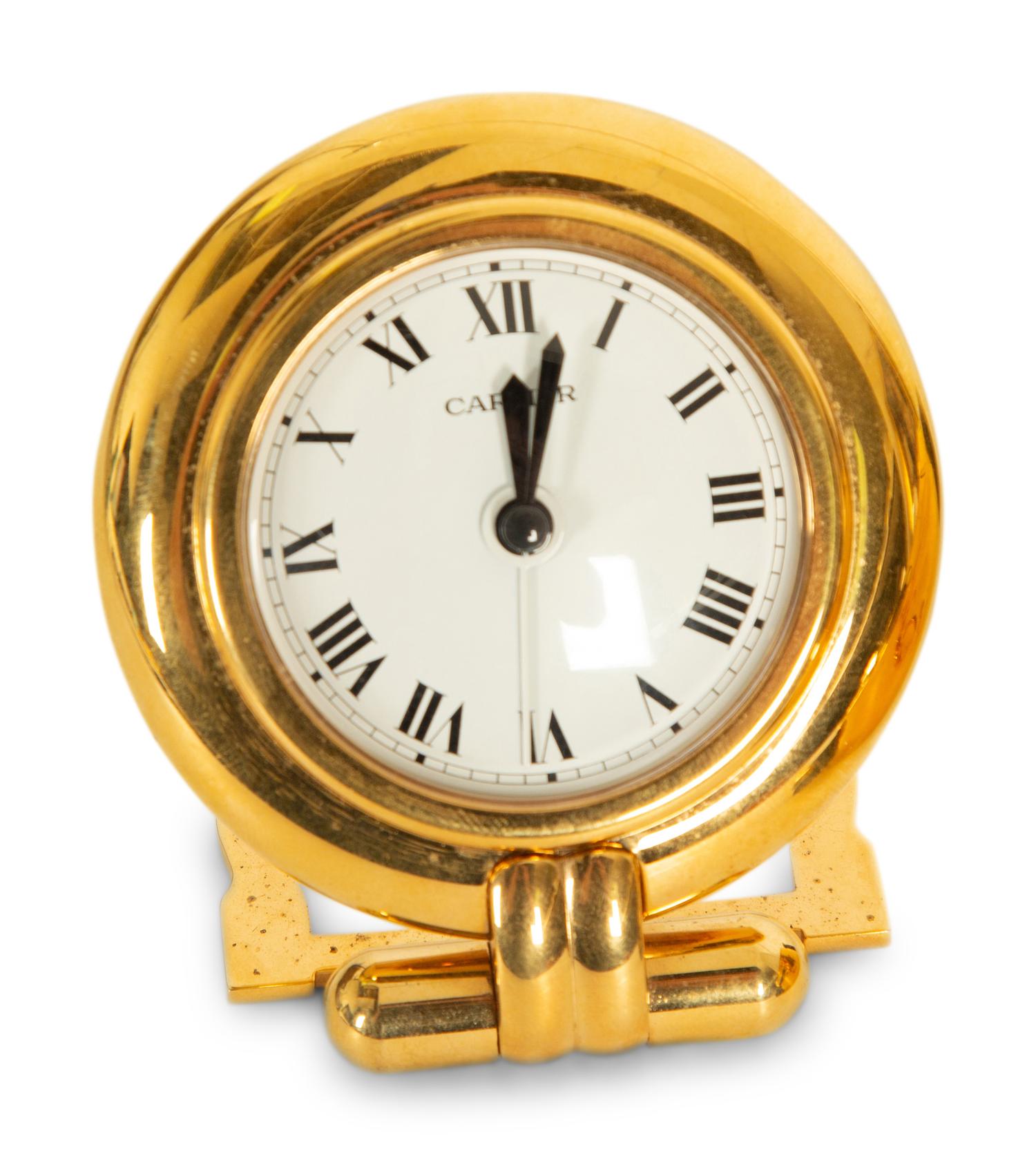 Three Cartier Desk Clocks — 20th Century