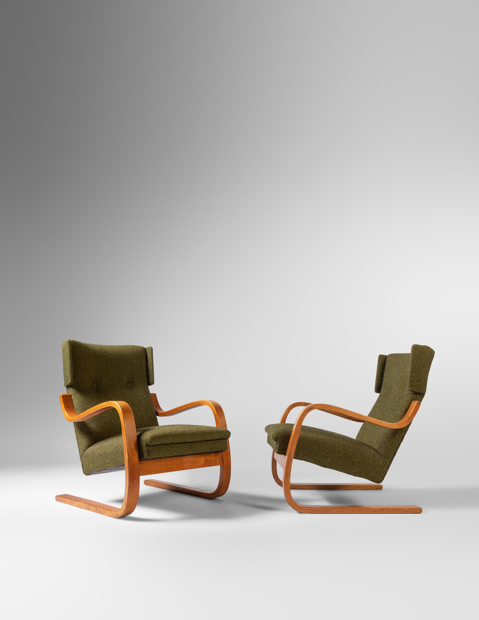 A Pair of Model 36 Lounge Chairs Finmar, Finland