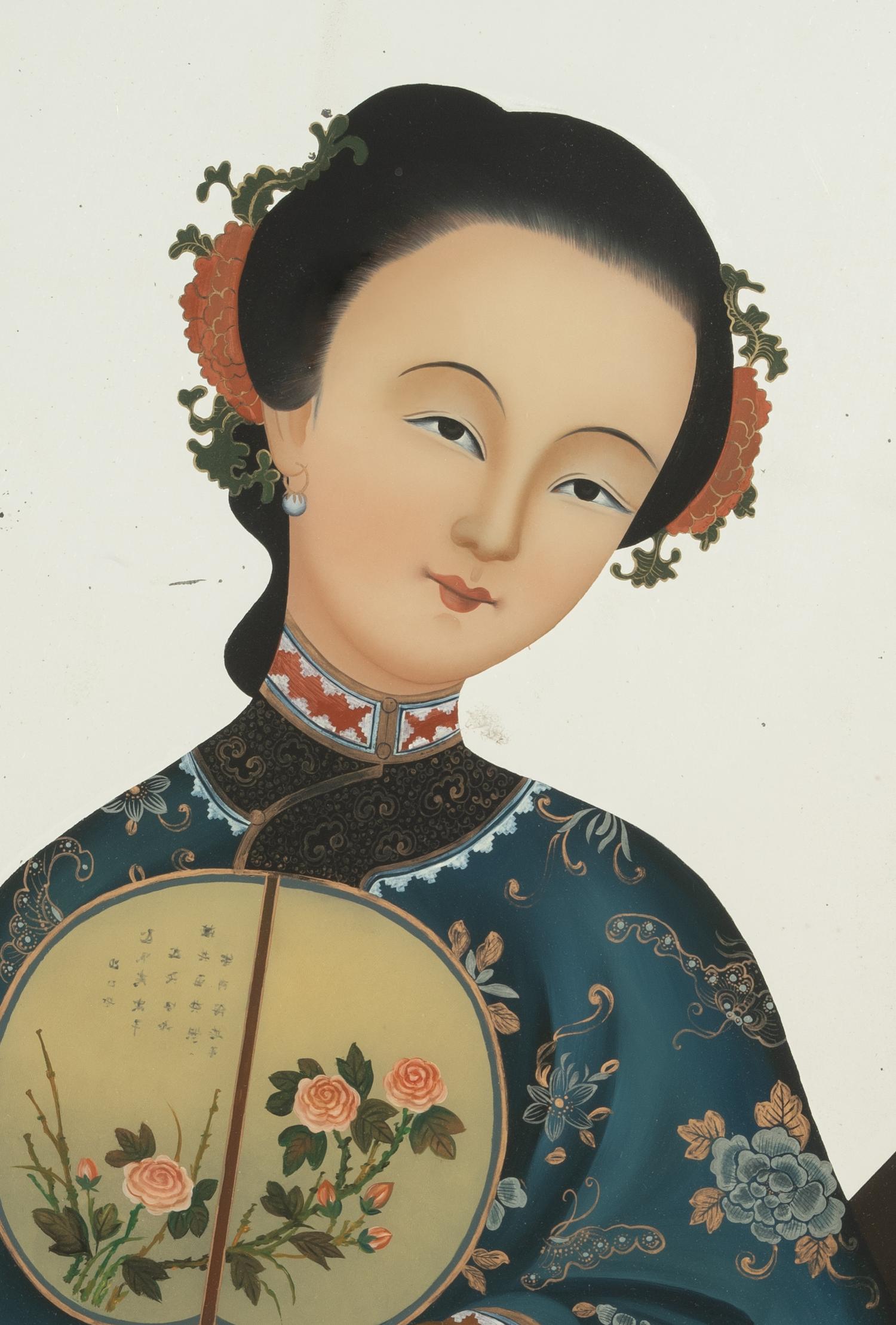 A Chinese Export Reverse-Painted Glass Mirror