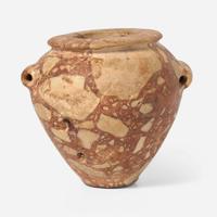 An Egyptian red breccia jar Predynastic Period (Naqada II), circa 3500-2900 B.C.